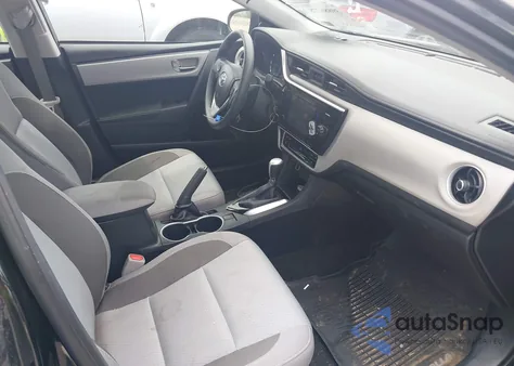 2017 Toyota Corolla Le z USA, uszkodzony, nr VIN 2T1BURHE6HC909640